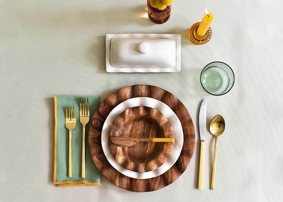 Overhead View of Individual Place Setting with a Mix of Ceramic and Wooden Pieces Including Fundamental Wood Ruffle Dinner Plate