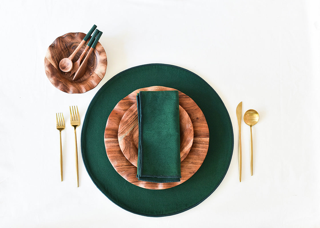 Overhead View of Individual Place Setting Set on Pine Color Block Round Placemat