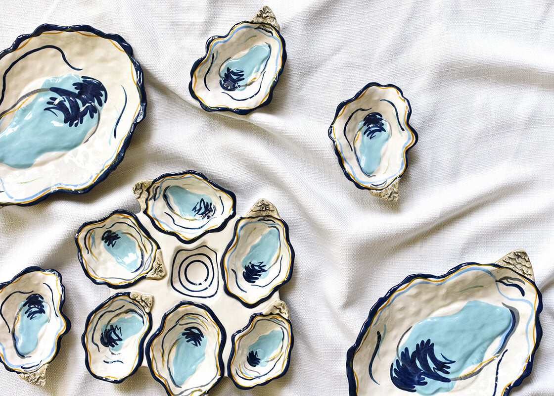 Cropped Close up of Oyster Collection Including Oyster Plate
