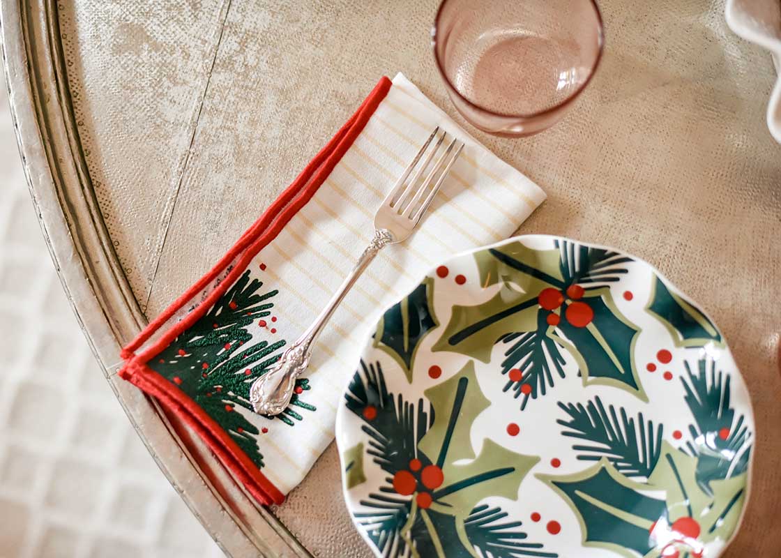 Overhead View of Coordinated and Simple Table Setting with Balsam Stripes Napkin and Coordinated Plate