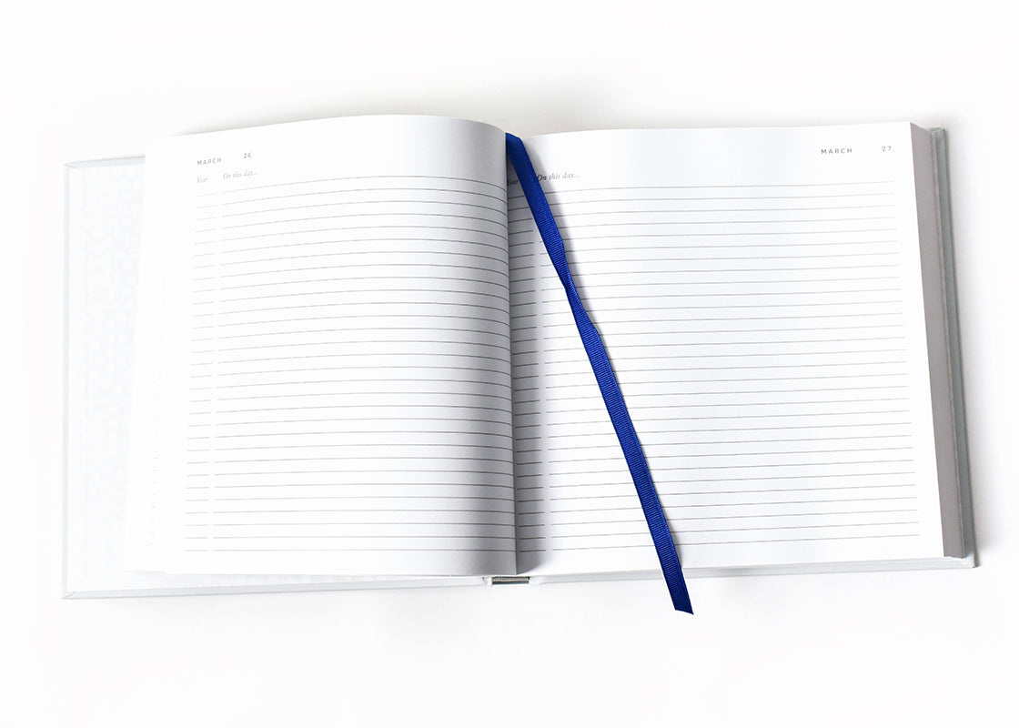 Cropped Close up of Lined pages and ribbon bookmark in Blue Celebrate Me Book