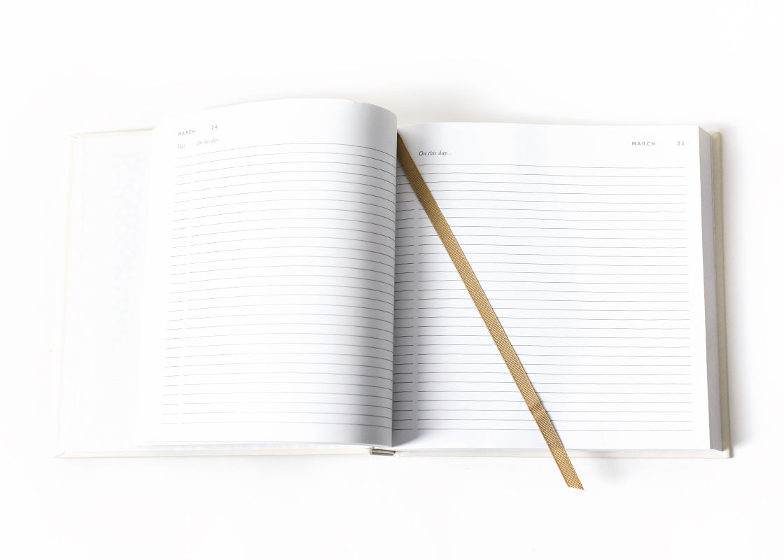 Overhead View of Open showing lined pages and ribbon bookmark Celebrate Us Book