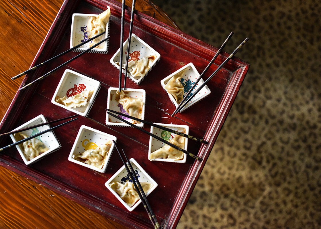 Overhead View of Rows of Chinese Zodiac Bowls and Trinket Bowls Showing all Patterns in Series Including Chinese Zodiac Snake Trinket Bowl