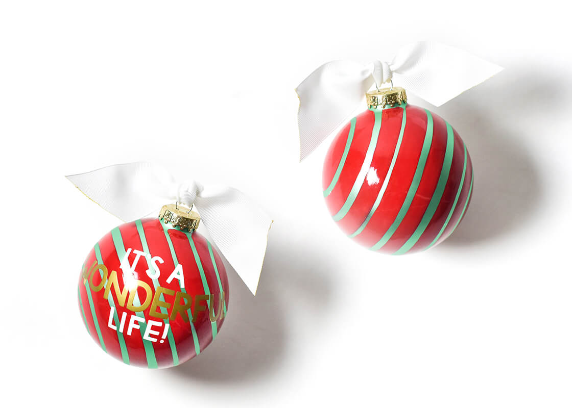 Front and Back View of It's a Wonderful Life Glass Ornament Placed Side by Side
