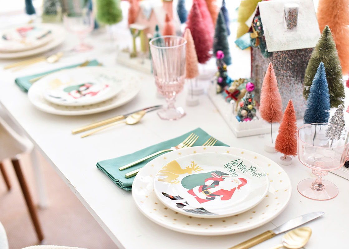 Front View of Place Setting with Coordinating Holiday Designs Including Christmas in the Village Rooftop Salad Plate