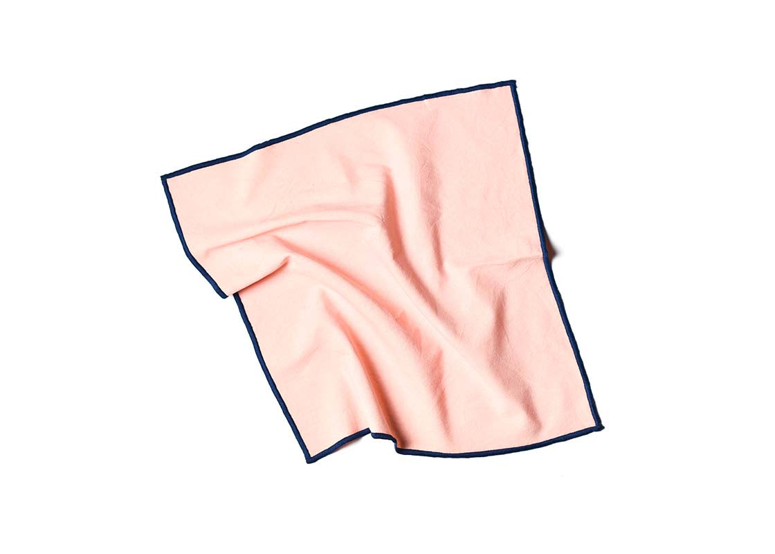 Overhead View of Crumpled Napkin Provence and Navy Color Block Napkins Showcasing Texture and Personality