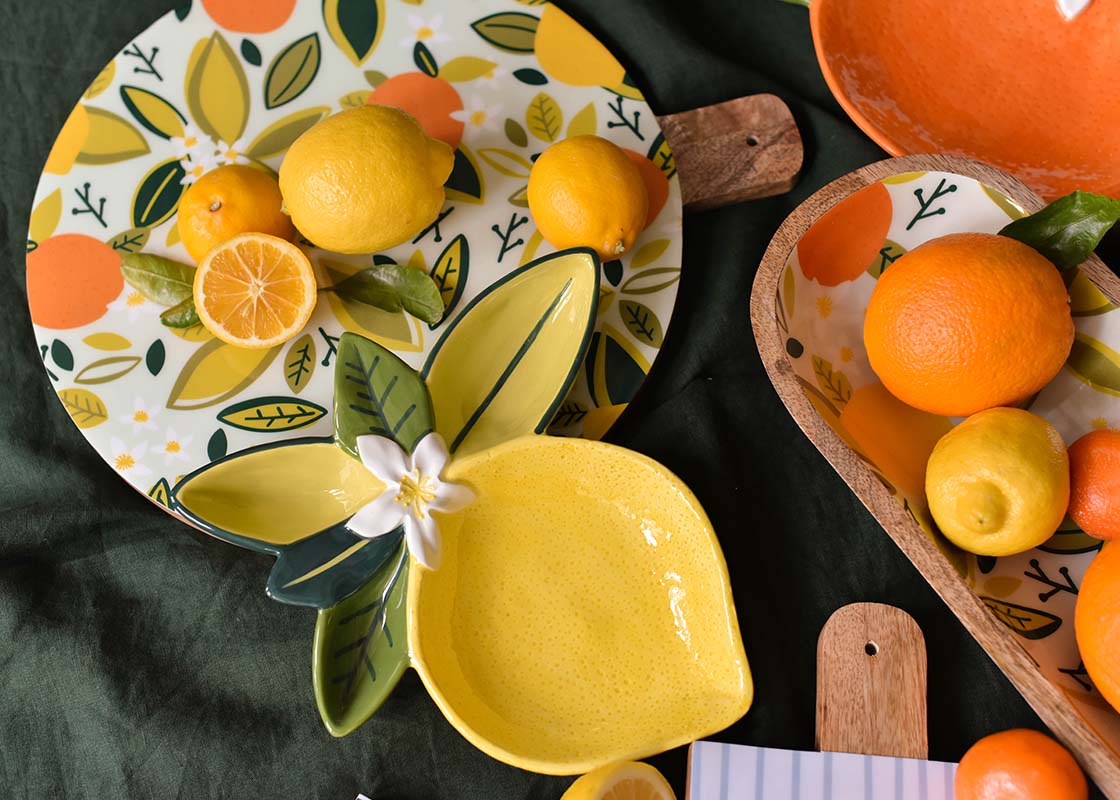 Close up of Citrus Collection Including Blue Citrus Print Wood Medium Round Board