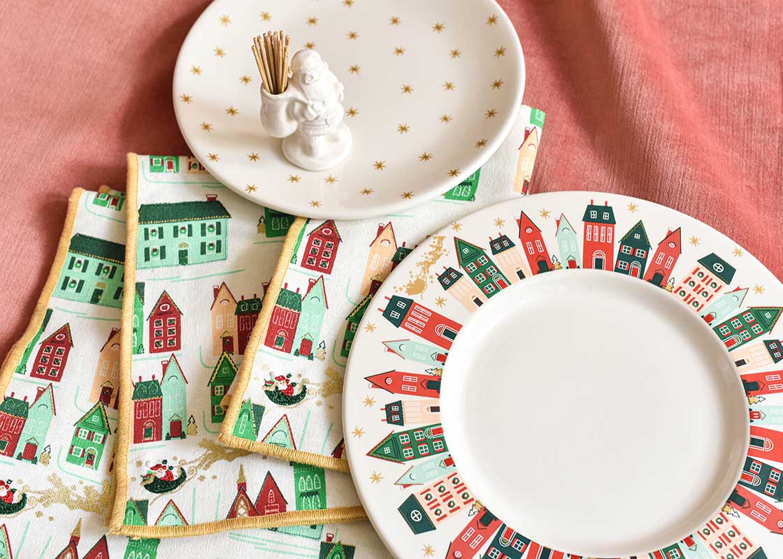 Cropped Close up of Christmas Dinnerware Featuring Flying Santa Rimmed Dinner Plate