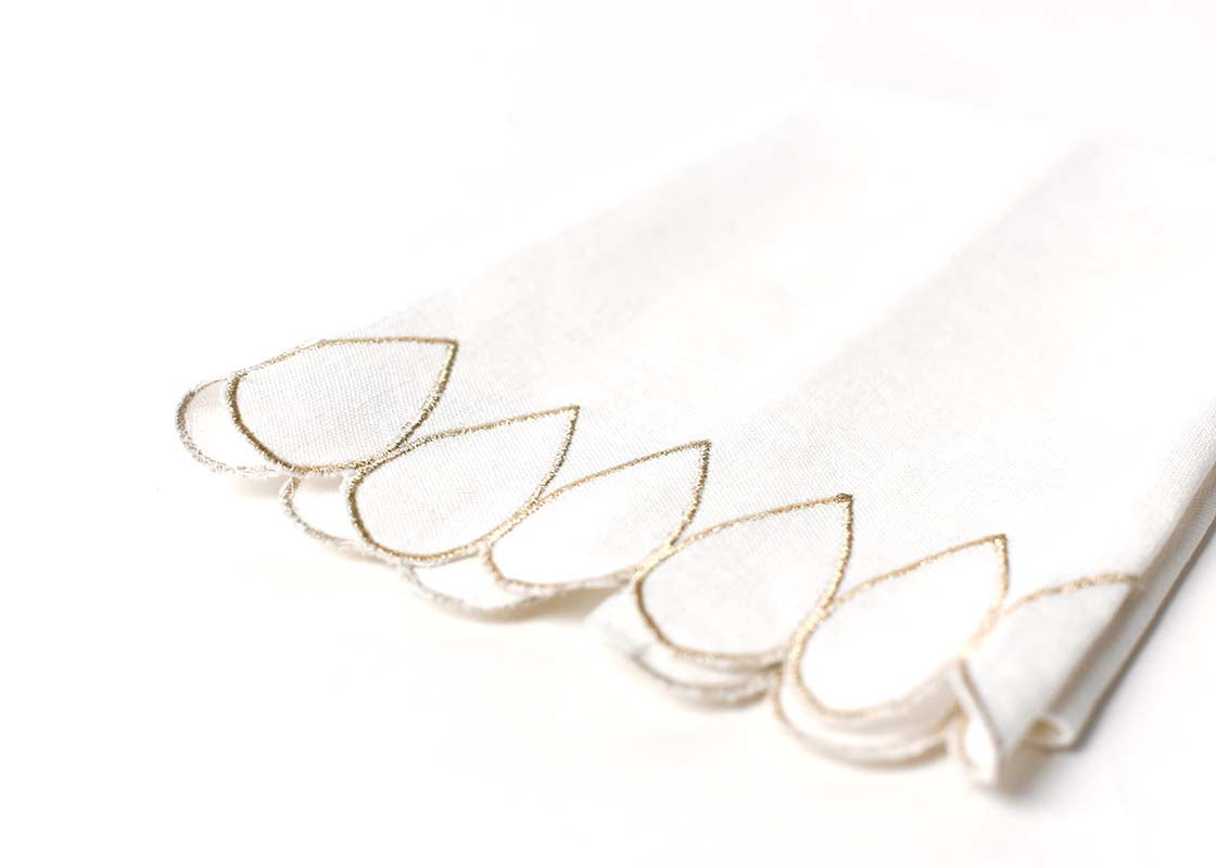 Cropped Close up of Embroidery on Hem of Folded Deco Gold Scallop Medium Hand Towel Showcasing Beautiful Texture of Fabric