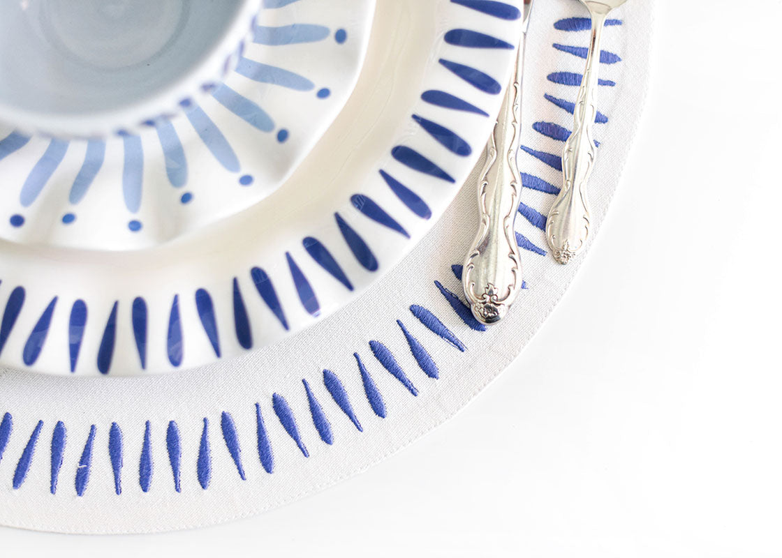 Overhead View of Iris Blue Drop Coordinating Designs Including Round Placemat