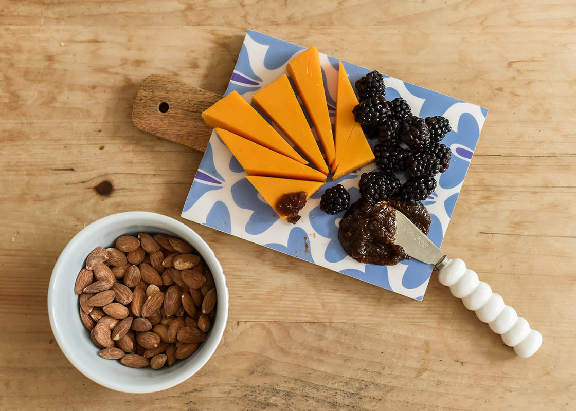 Front View of Appetizers Served on Iris Blue Design Serveware Including Iris Blue Drop Small Bowl