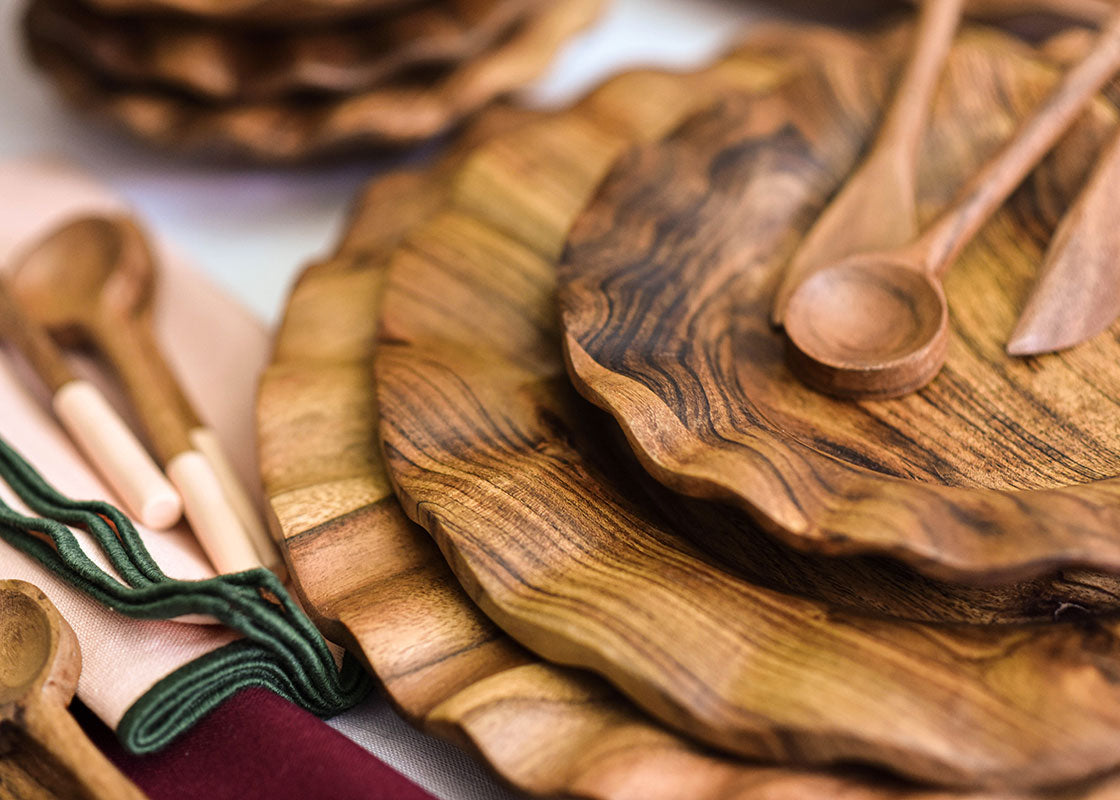 Front View of Fundamental Place Setting Including Wood Ruffle Platter