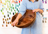 Woman Carrying Large Ruffle Bowl Fundamental Collection