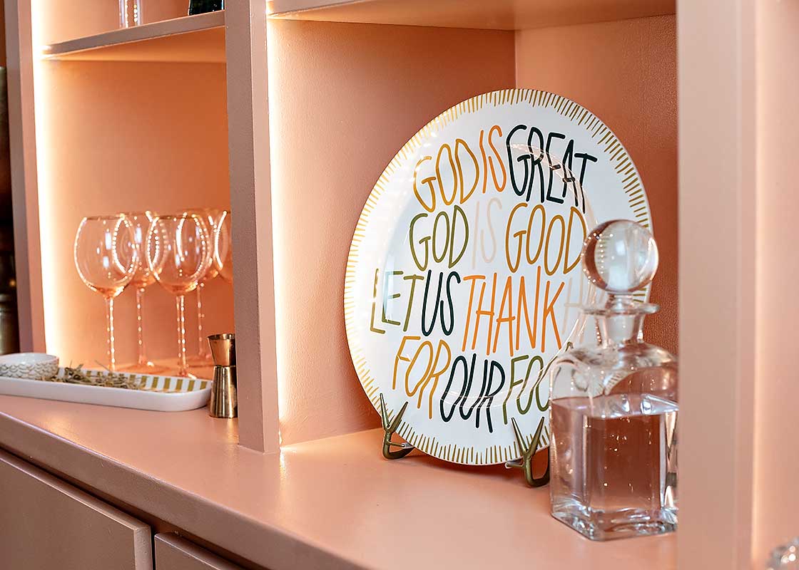 Cropped Close up of Dusk God is Great Serving Platter Displayed in Home on Plate Stand