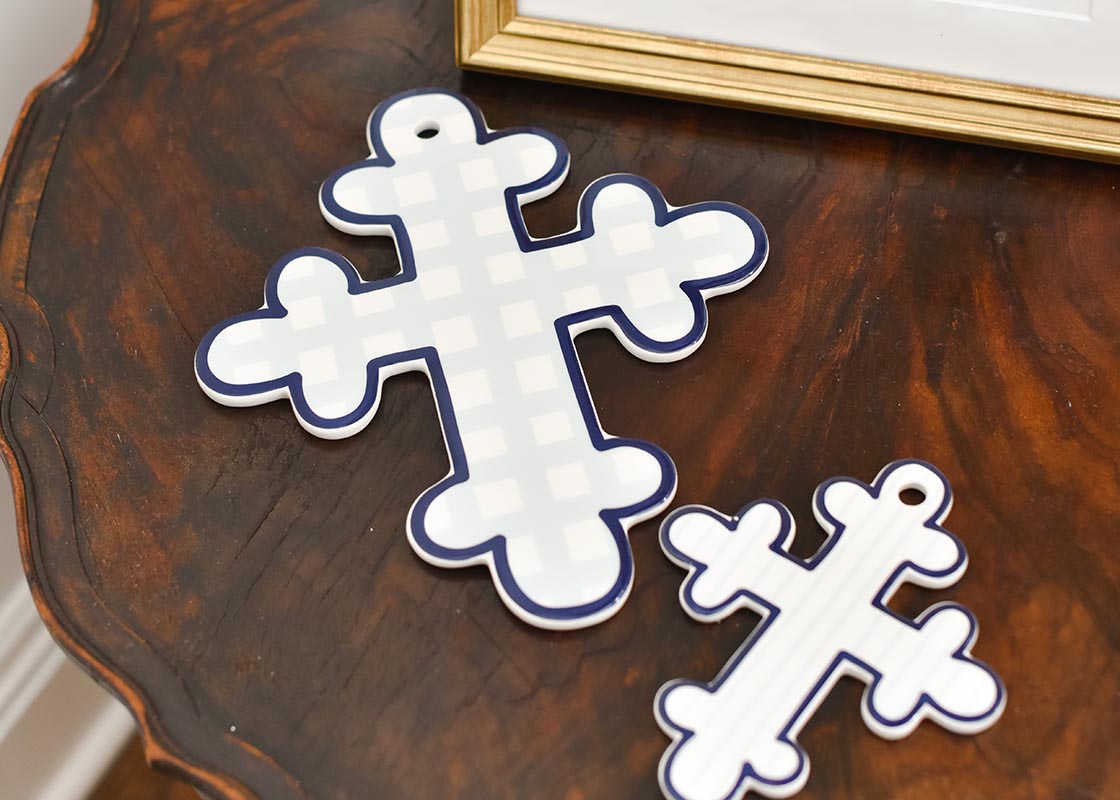Overhead View of Crosses on a Table Including 10in Ceramic Cross Blue Gingham Design