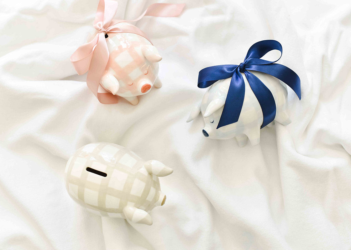 Overhead View of Gingham Design Piggy Banks Including Pale Blue and White Gingham