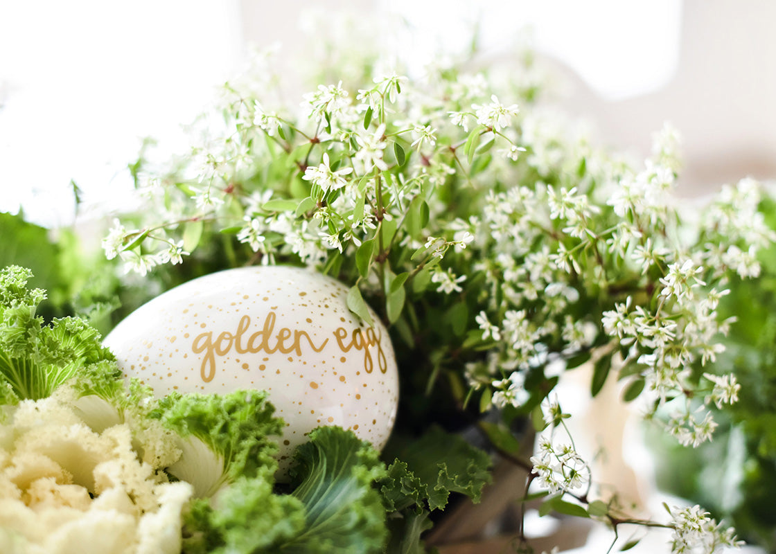 Front View of Easter Tablescape Including Speckled Golden Egg Waiting to become the Ultimate Easter Egg Hunt Prize