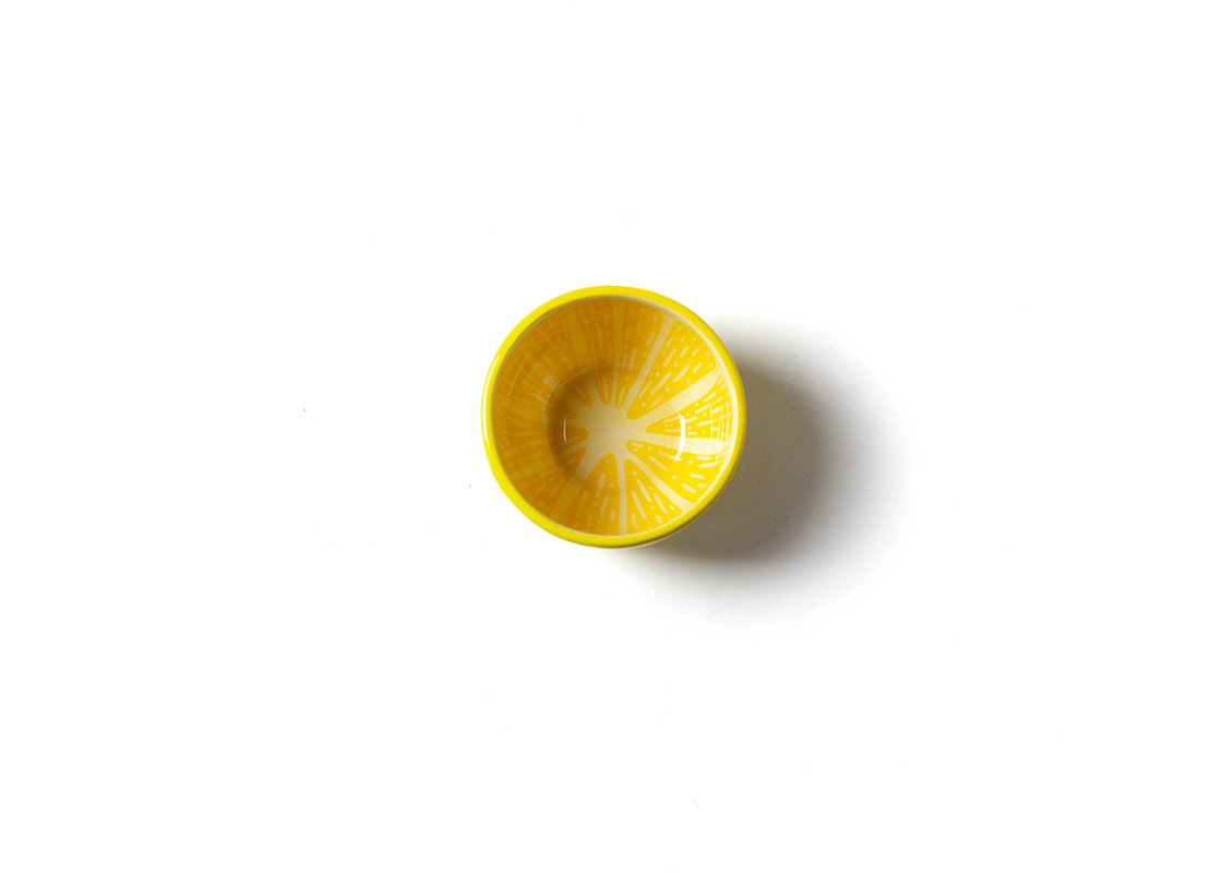 Interior view of Ceramic Lemon Appetizer Bowl Featuring it's Clever Design Resembling an Orange Slice with Fruit Sections