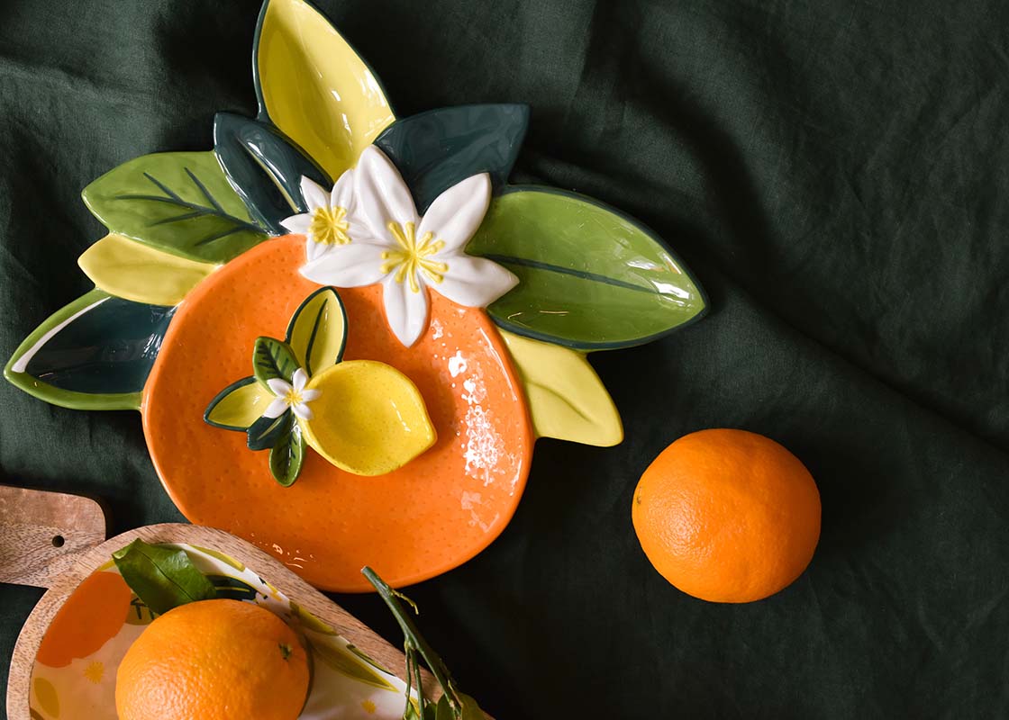 Extreme Cropped Close up of Orange Platter with Coordinating Citrus Designs