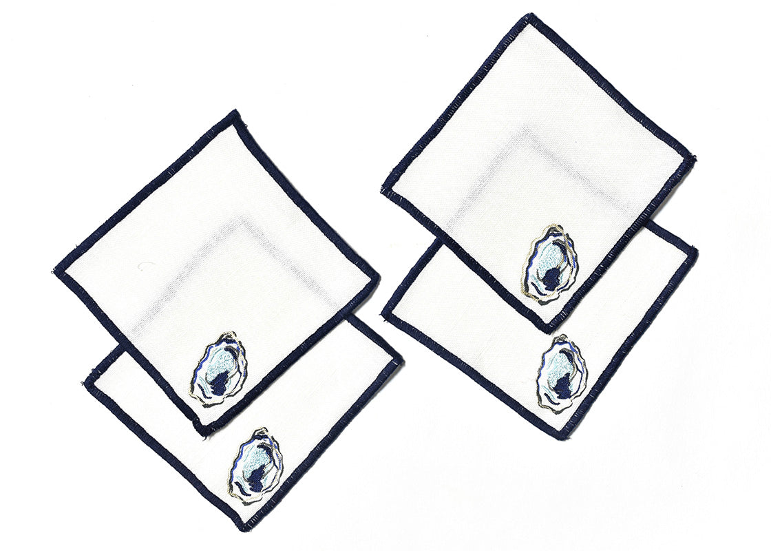 Overhead View of Creatively Placed Oyster Cocktail Napkins Set of 4 Showing all Pieces in Set and Personality