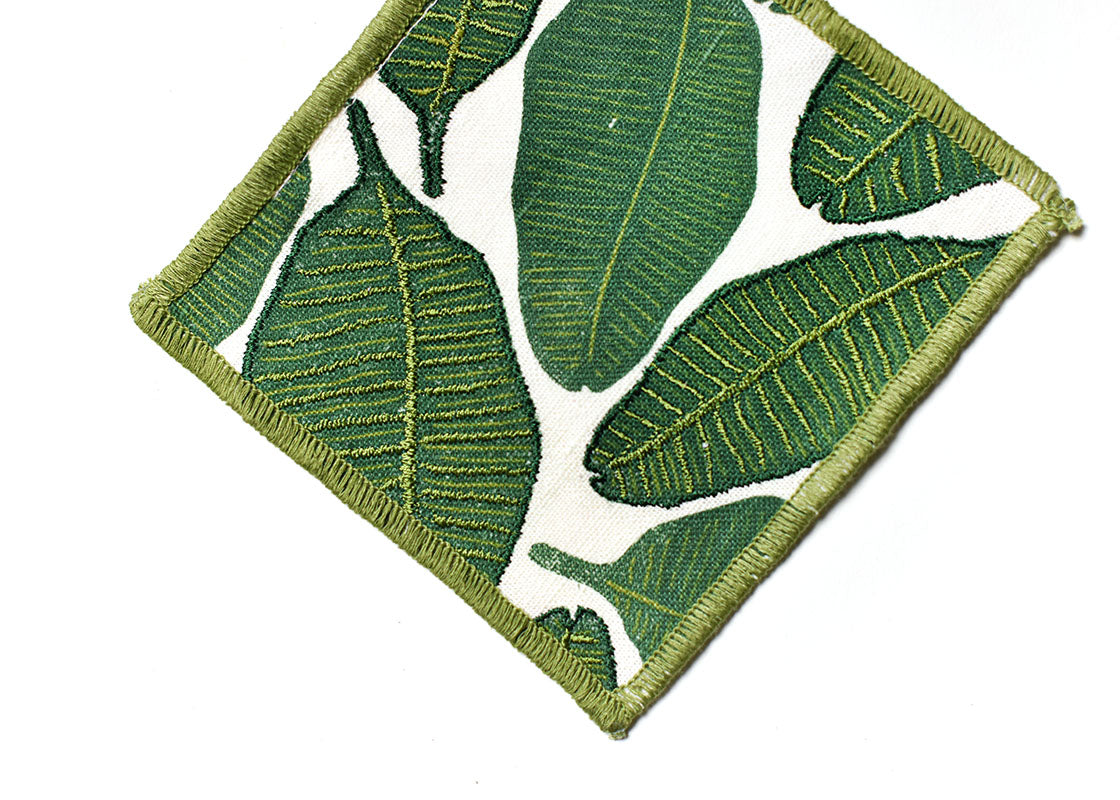 Cropped Close up of Embroidery on One Cocktail Napkin in Palm Print Cocktail Napkin Showcasing Beautiful Texture of Fabric