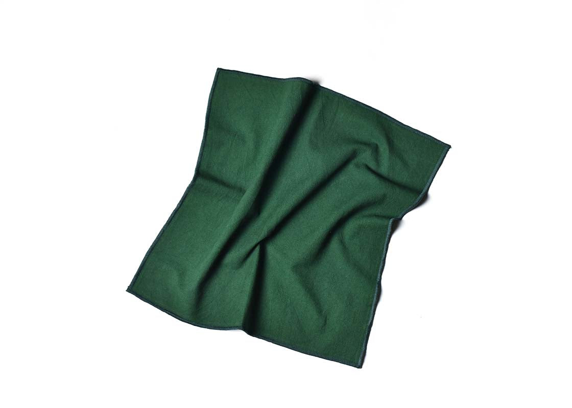 Overhead View of Crumpled Napkin Pine Color Block Napkin Showcasing Texture and Personality