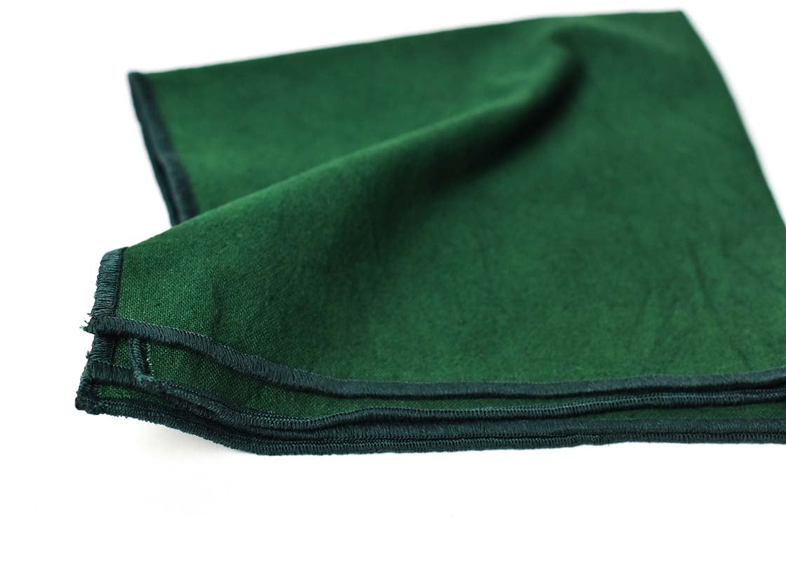 Cropped Close up of Pine Hem Stitched Edging on Folded Pine Color Block Napkins Set of 4 Showcasing Beautiful Texture of Fabric