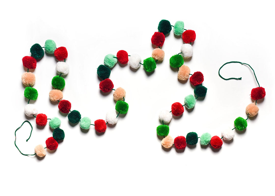 Overhead View of Creatively Placed Mint Multi Pom Pom Garland Showing Full Garland
