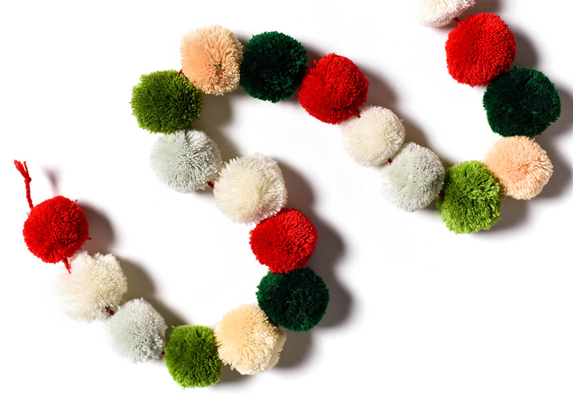 Cropped Close up of Pom Poms on Olive Multi Pom Pom Garland