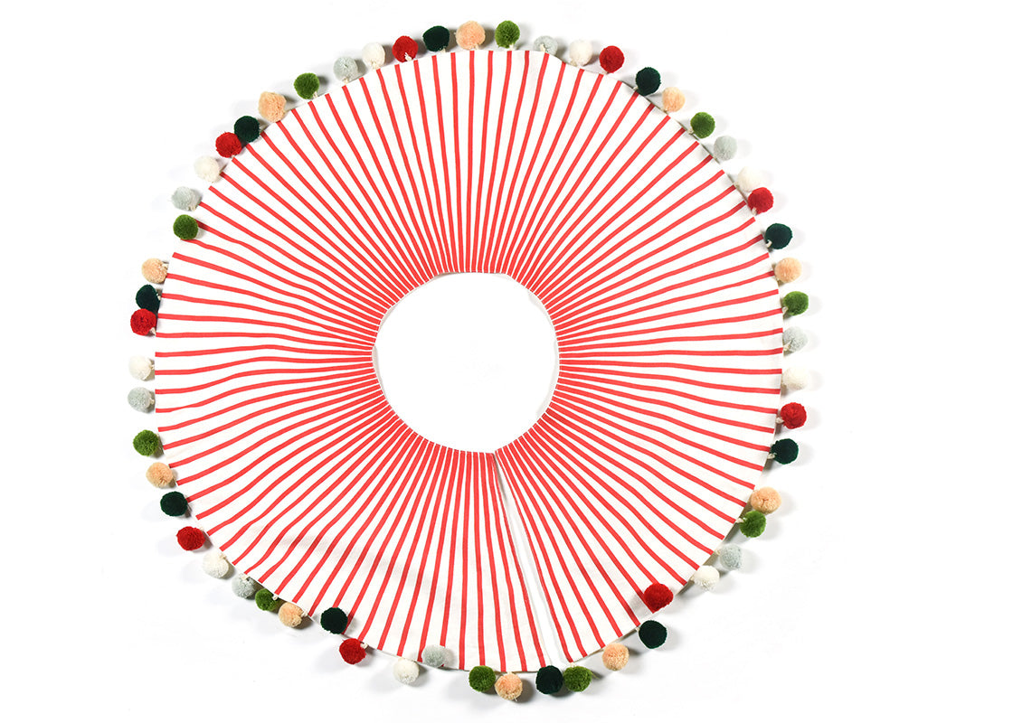 Overhead View of Fully Opened Red Stripe Tree Skirt with Pom Poms Showing Complete Design