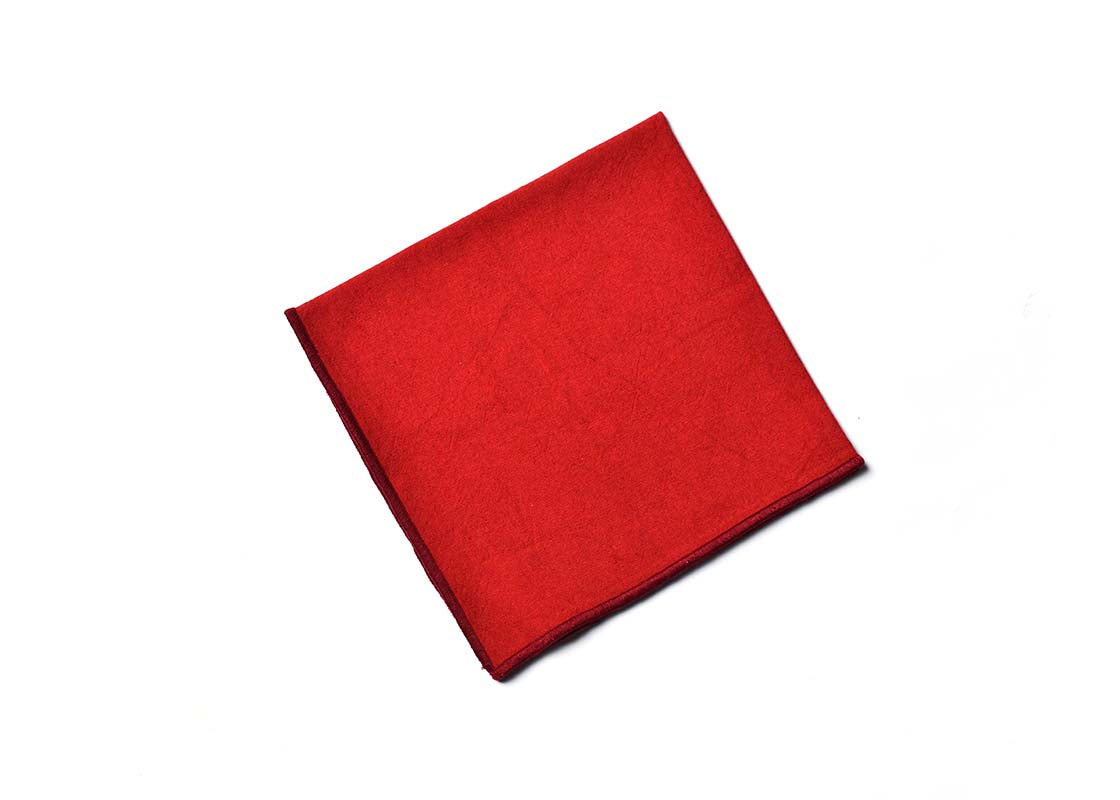 Overhead View of Folded Square Red Color Block Napkin Showcasing Closer Look at Design Details