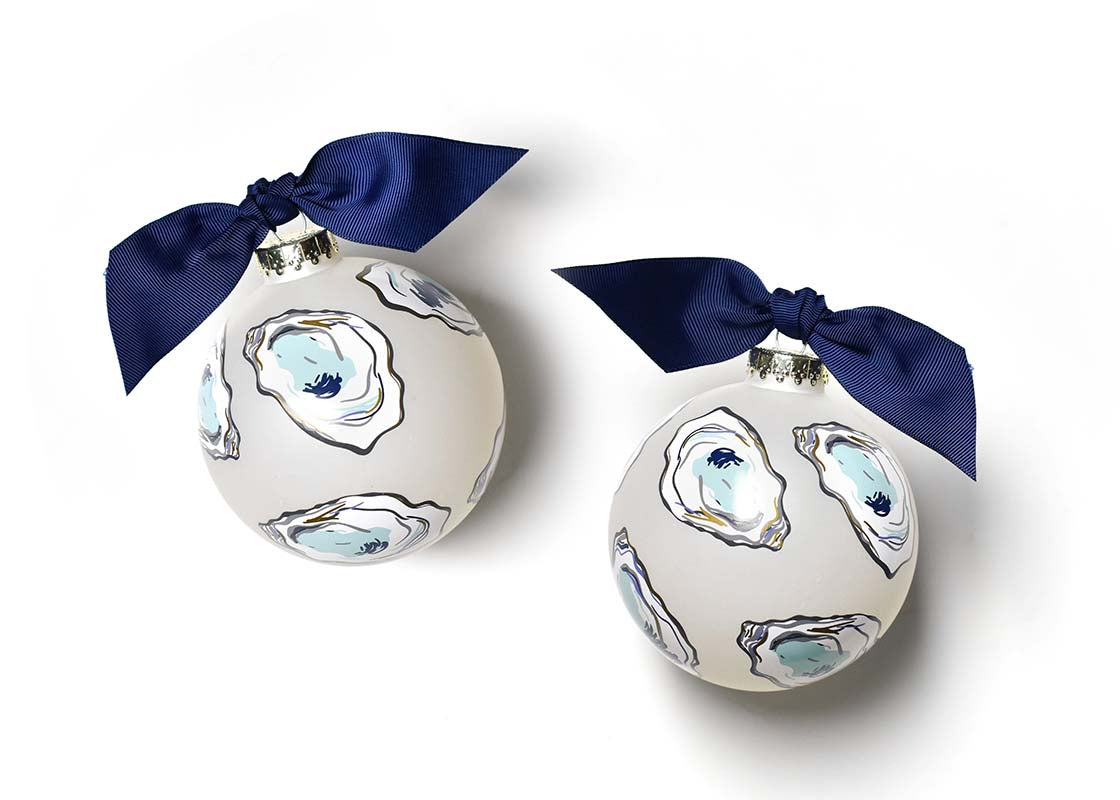 Front and Back View of Oyster Print Glass Ornament Placed Side by Side
