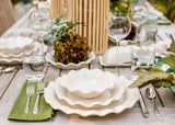 Tablescape of Coordinating Coton Colors Signature White Ruffle Designs Including Flare Small Bowl