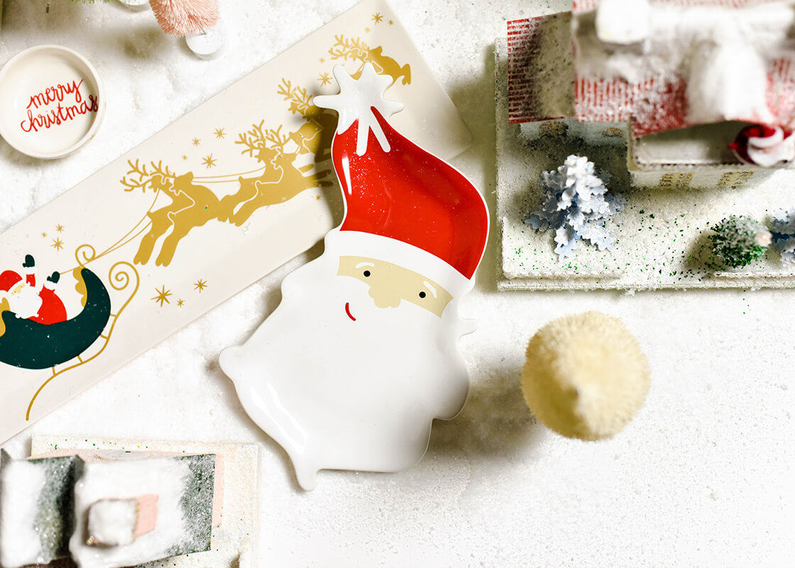 Overhead View of Holiday Dinnerware Including Vintage Santa Platter