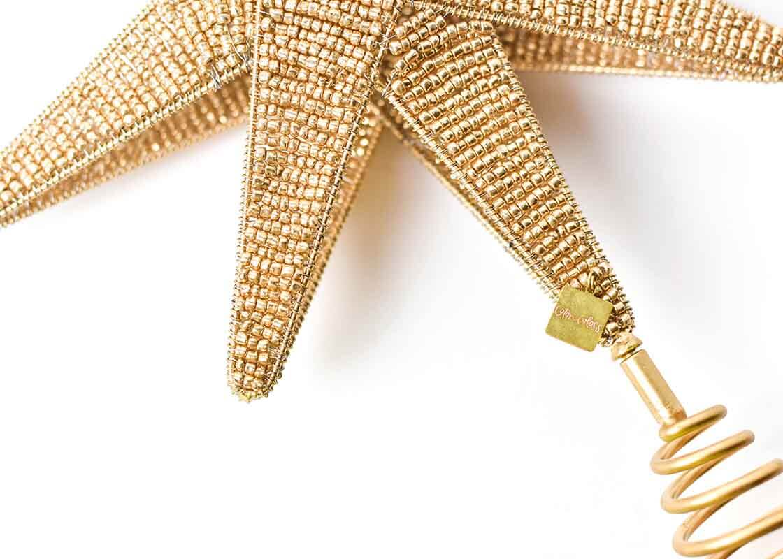 Cropped Close up of Detailed Beading and Spiral Holder on Gold Beaded Star Large Tree Topper