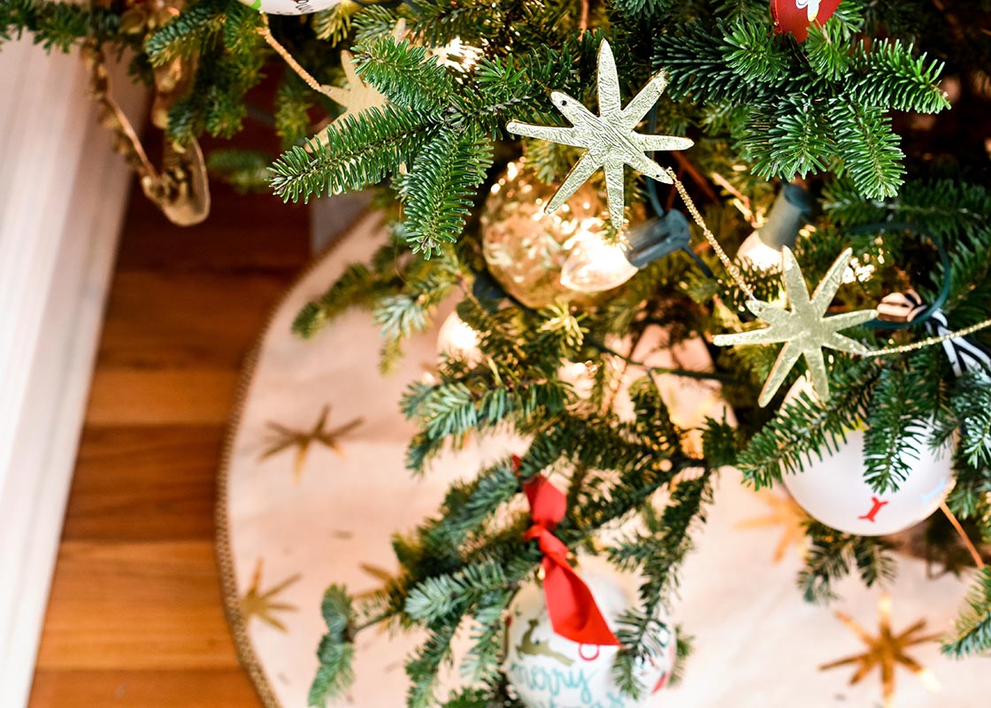Overhead View of Christmas Tree with Gold Garland Stars