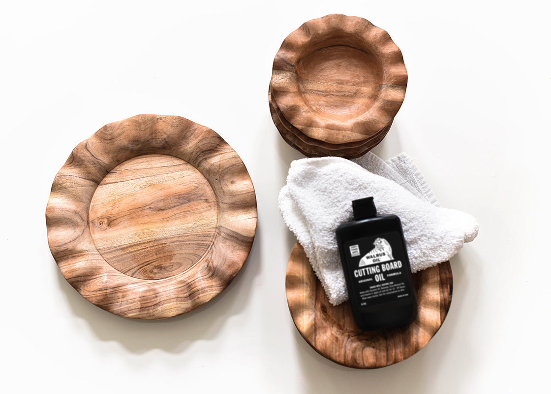 Overhead View of Wood Treatment Oil Bottle and Cloth Placed with Fundamentals Wood Collection
