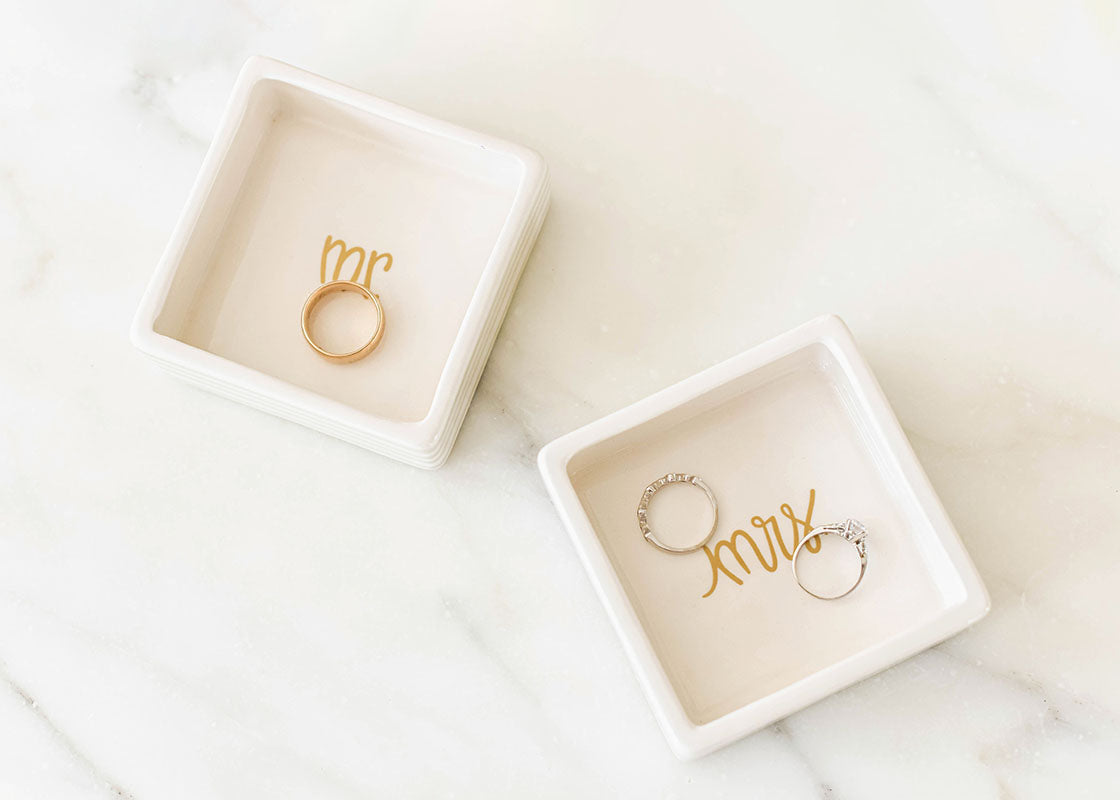 Overhead View of Wedding Rings Inside Mr. and Mrs. Square Trinket Bowls