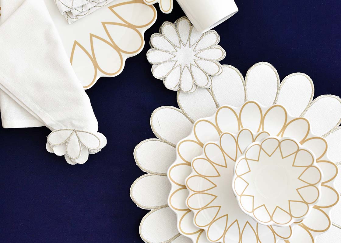 Overhead View of Coordinating Pieces from Deco Collection including Deco Gold Scallop 4 Piece Place Setting