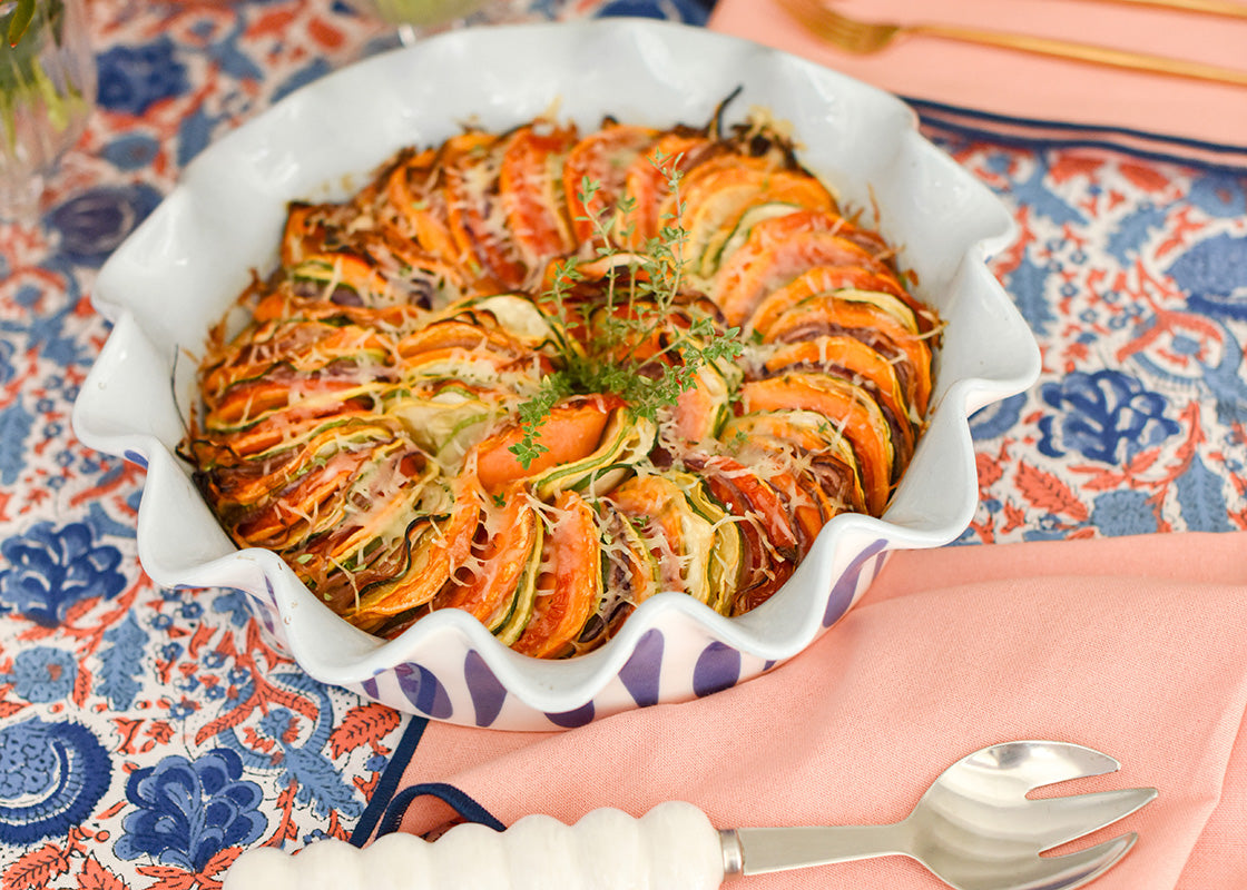 Cropped View of Ruffled Oven-to-Table Pie Dish Serving 'Sweet Potatoes au Gratin' with Coordinating Coton Colors Linens