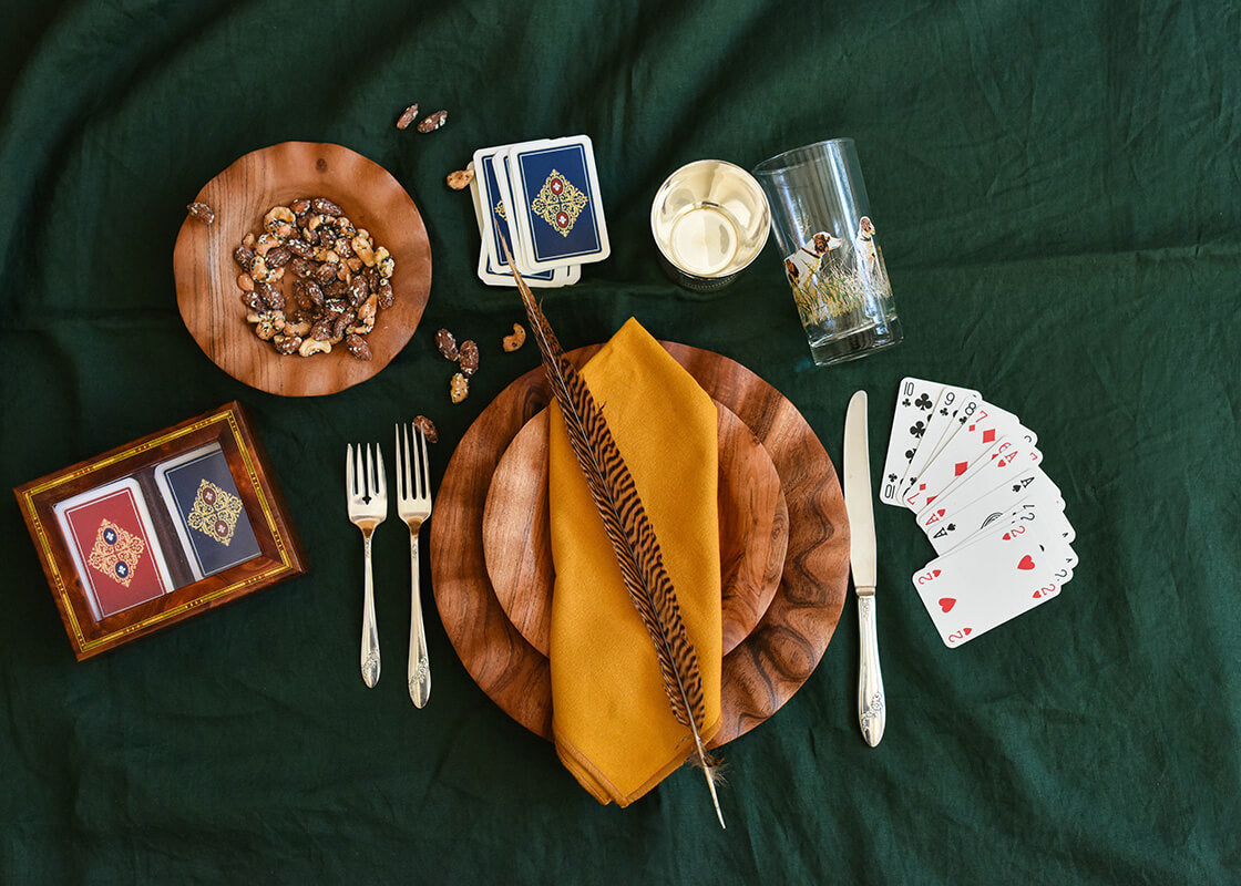 Overhead View of Individual Place Setting using Fundamentals Collection including Fundamental Wood Ruffle Salad Plate Inspiring a Night Playing Cards