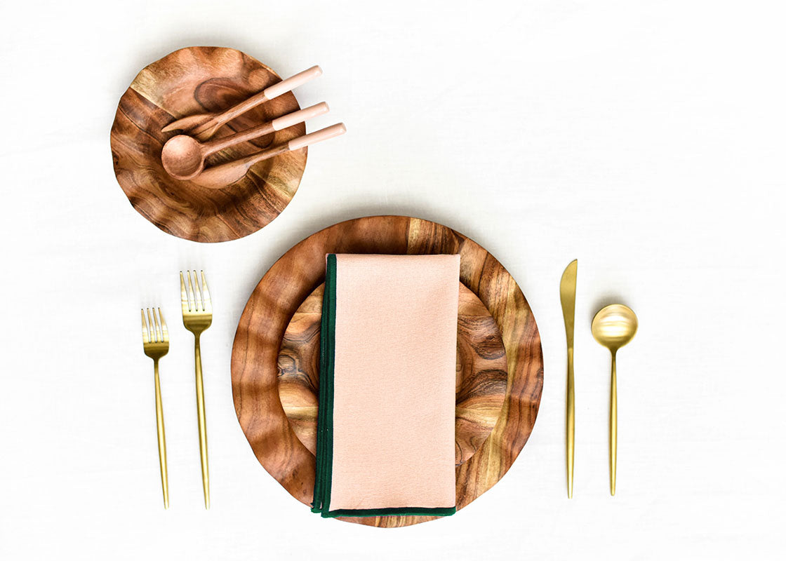 Overhead View of Fundamentals Collection Wood Utensil Set Including Blush Appetizer Fork