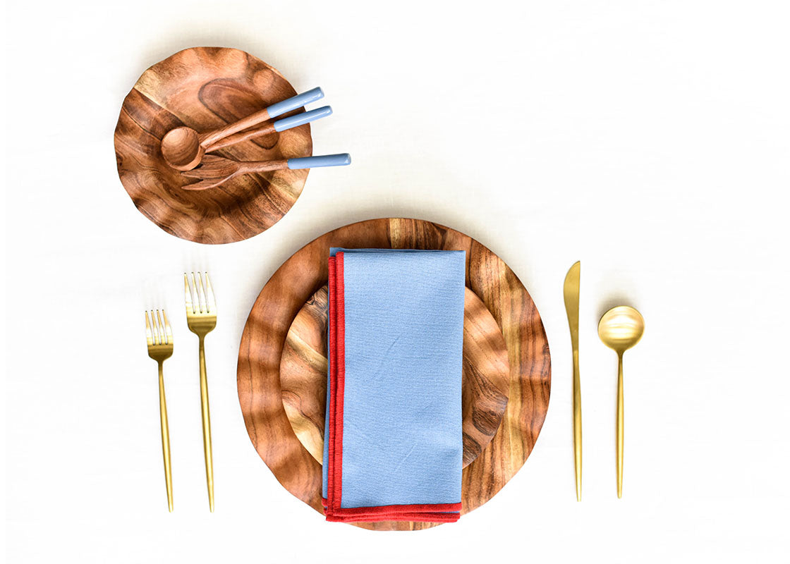 Overhead View of Fundamentals Collection Wood Utensil Set Including Blue Appetizer Fork