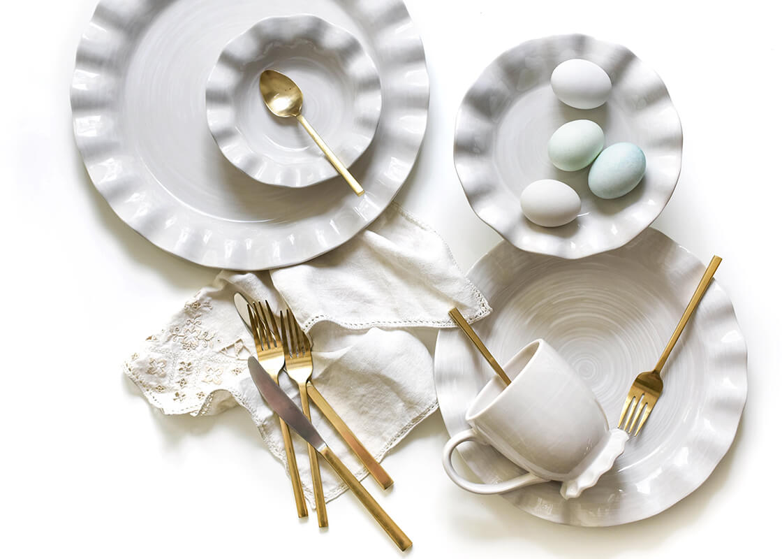 Overhead View of Signature White Ruffle Salad Plate with Pastel Blue Eggs