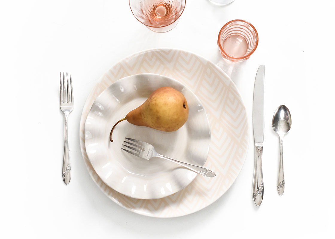 Overhead View of Feminine Place Setting with Blush Colors and Signature White Ruffle Salad Plate