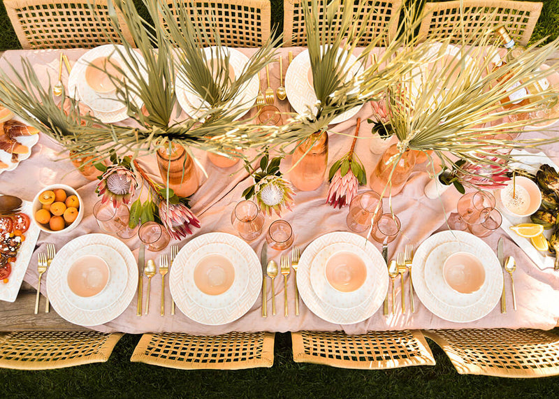 Overhead View of Tropical Tablesccape with Coordinating Blush Arabesque Designs