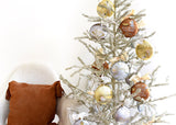 Silver Tinsel Tree Decorated with Nativity-Themed Religious Christmas Ornaments