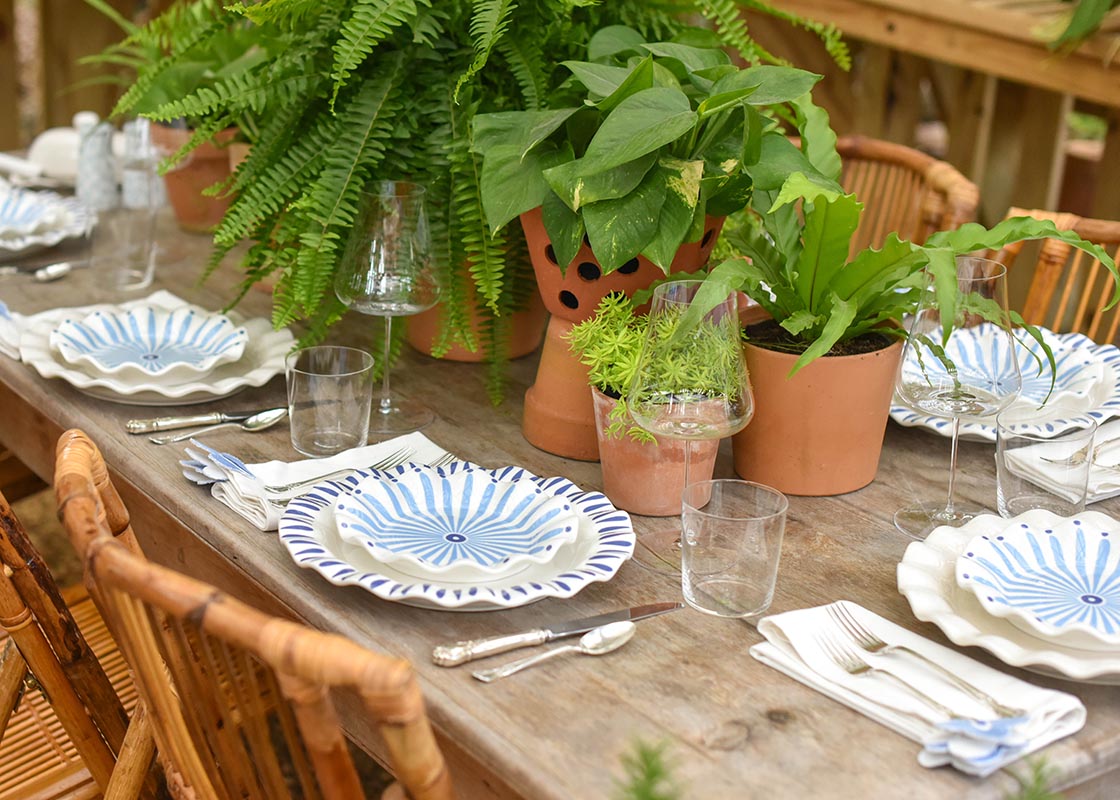 Front View of a Garden Party Tablescape using Iris Blue Burst Ruffle Salad Plate in Set of 4