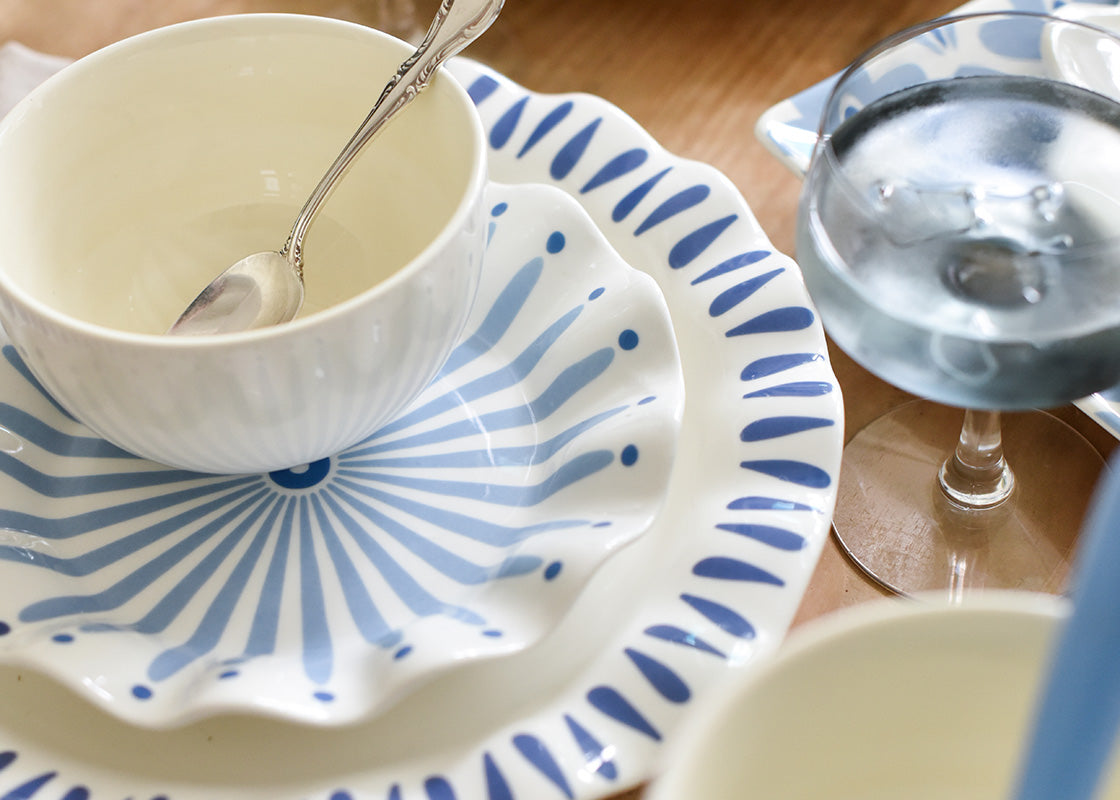 Cropped Close up of Ruffle Salad Plate with Coordinating Iris Blue Burst Tableware