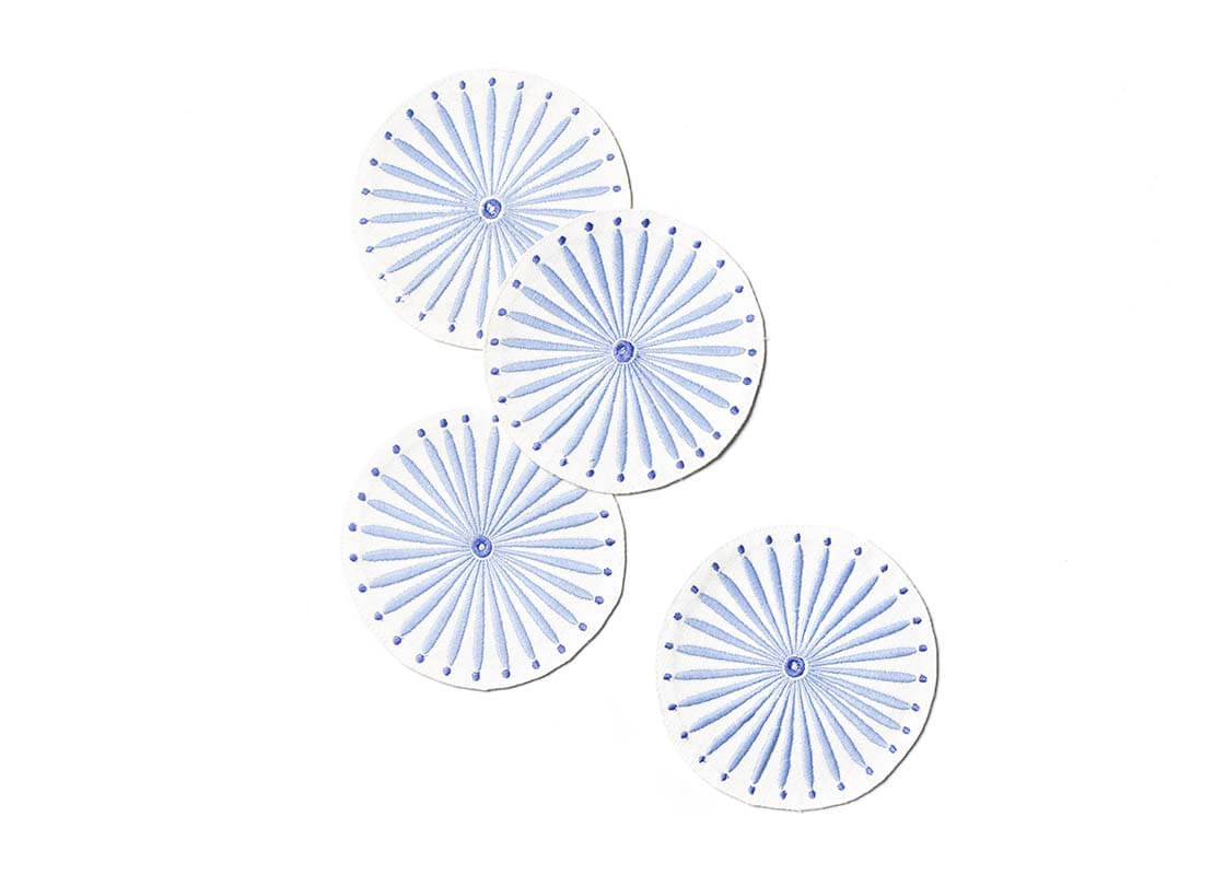 Overhead View of Creatively Placed Iris Blue Burst Round Cocktail Napkins Set of 4 Showing all Pieces in Set and Personality